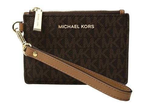 michael kors small coin purse wristlet|Michael Kors evening clutch.